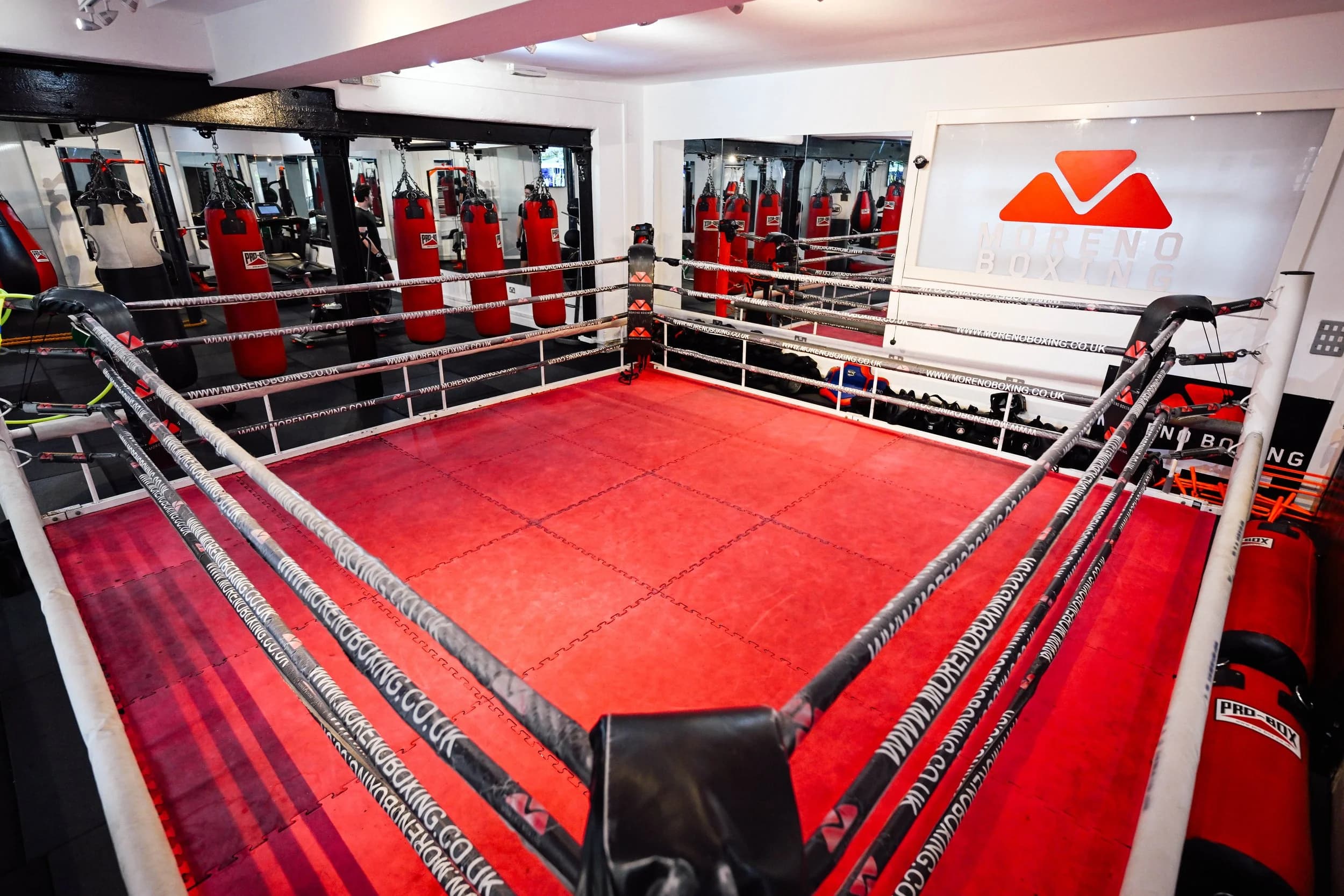 Carlos Moreno and Moreno Boxing members in the gym